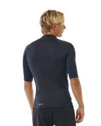 The Rip Curl Dawn Patrol UPF Performance Rash Vest in Navy Marle