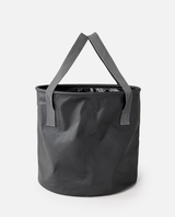 The Rip Curl Surf Series 50L Bucket in Black & Grey