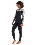 The Billabong Womens Salty Dayz Natural 4/3mm Chest Zip Wetsuit in Black Floral