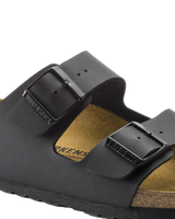 The Birkenstock Womens Arizona Birko Flor Sandals in Black