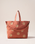 The Elizabeth Scarlett Sun Goddess Canvas Carryall in Rust