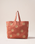 The Elizabeth Scarlett Sun Goddess Canvas Carryall in Rust