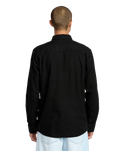 The Volcom Mens Caden Solid Shirt in Antique Black
