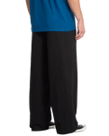 The Volcom Mens Baggos Pleat Trousers in Black