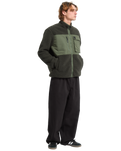 The Volcom Mens Storm Stone Fleece Jacket in Rinsed Black