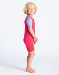 The C-Skins Girls C-Kid Baby Shorty Wetsuit in Coral, Lilac & Bright Coral