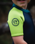 The C-Skins Boys NuWave C-Kid Baby Front Zip Shorty Wetsuit in Bluestone & Lime