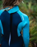 The C-Skins Boys NuWave Legend 3/2mm Back Zip Wetsuit in Bluestone, Blue & Red