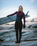 The C-Skins Womens NuWave Surflite 5/4mm Back Zip Wetsuit in Black, Rust & Yellow