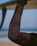 The C-Skins Womens NuWave Surflite 5/4mm Back Zip Wetsuit in Black, Rust & Yellow
