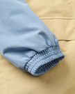 The Passenger Womens Serein Waterproof Parka Jacket in Faded Denim & Desert