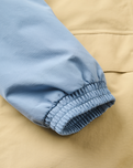The Passenger Womens Serein Waterproof Parka Jacket in Faded Denim & Desert