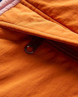 The Passenger Womens Ocean 2.0 Insulated Jacket in Dark Denim & Sunset Orange
