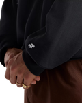 The New Balance Mens Numeric Team Sweatshirt in Black