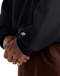 The New Balance Mens Numeric Team Sweatshirt in Black