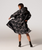 The Rain Kiss Womens Rain Poncho in Black Polka