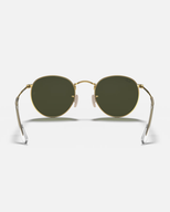 The Ray-Ban Round Metal Sunglasses in Black & Gold