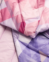 The Rumpl Original Puffy Blanket in Geo Rose