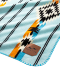 The Slowtide Journey Fleece Blanket in Light Blue