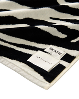 Skatie Zebra Premium Woven Towel in Black