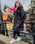 The Dryrobe Kids Advance Long Sleeved Dryrobe in Black & Pink