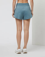 The Vuori Womens Halo Performance Short 2.0 in Smoke Blue Heather