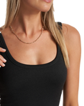 The Vuori Womens Halo Essential Jumpsuit in Black Heather